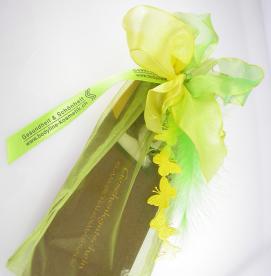 dekorativ und liebevoll verpackter Gutschein